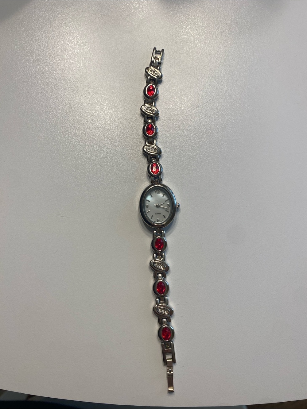 Silver Women's Bracelet Watch with Ruby Stone Accents